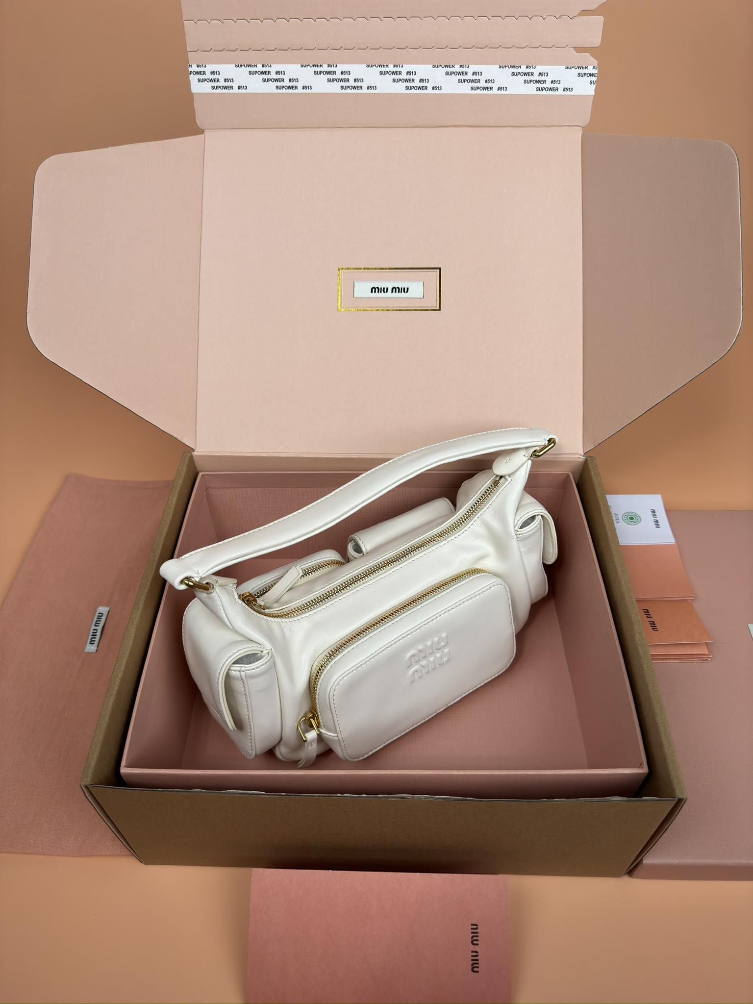 Miu Miu Hobo Nappa leather pocket bag 12x21x6cm