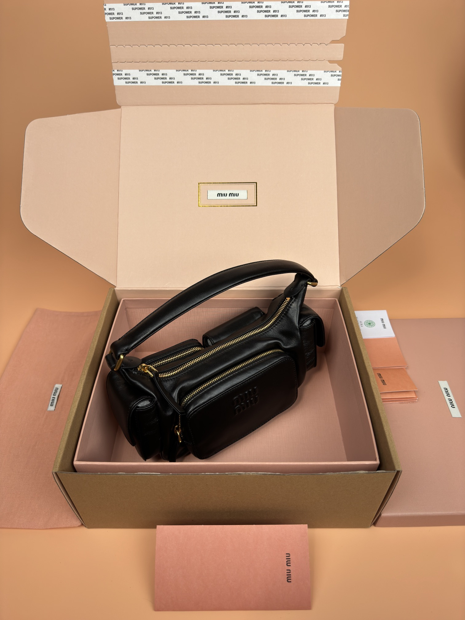 Miu Miu Hobo Nappa leather pocket bag 12x21x6cm